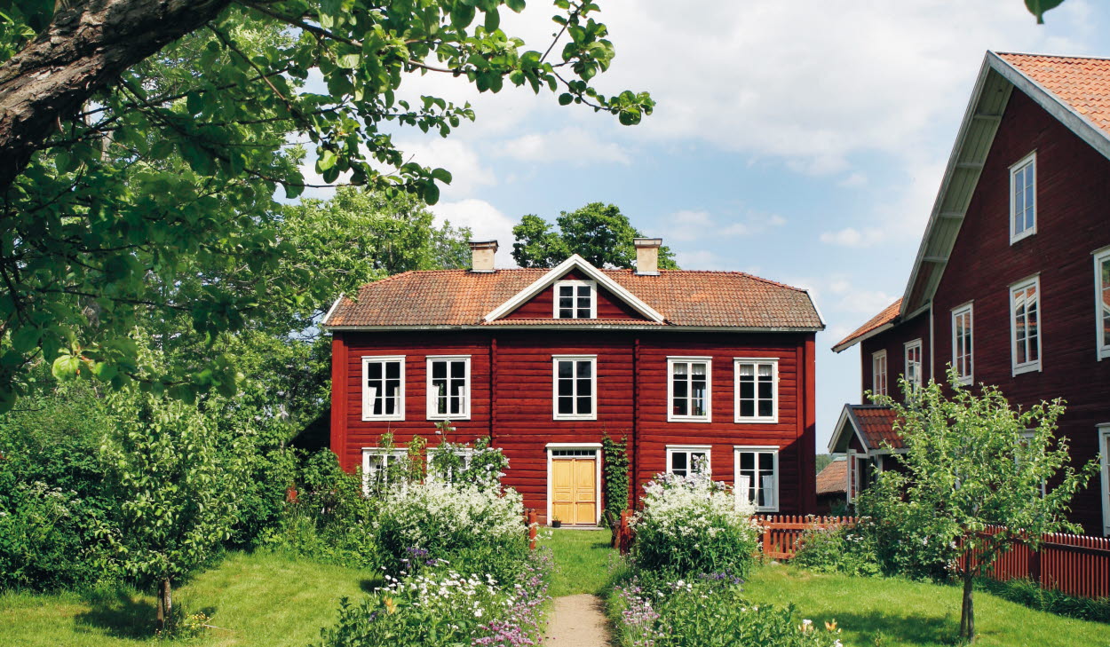 Världsarvsgården Erik Anders omringad av grönska